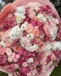 Bouquet premium dans des tons pêche et rose