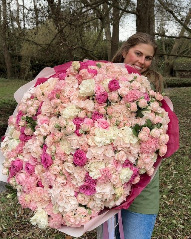 Grand bouquet premium dans des tons framboise