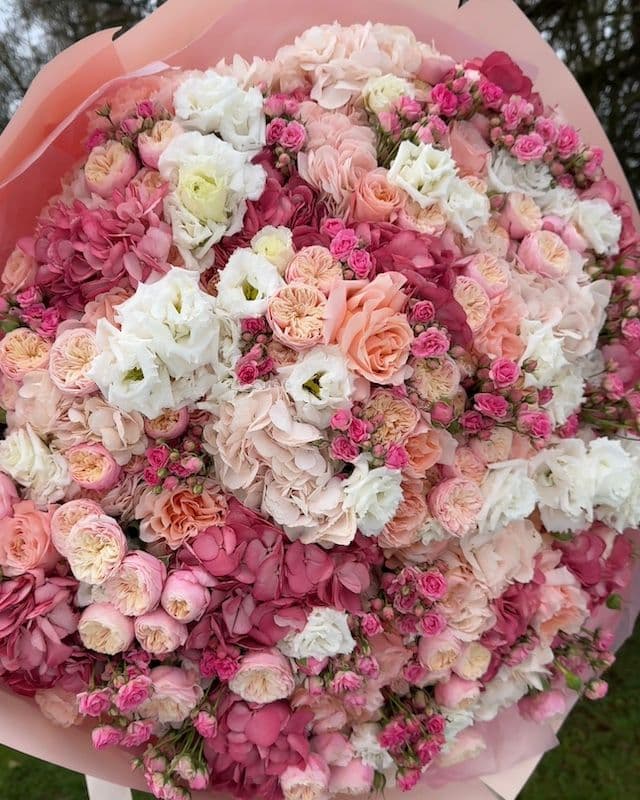 Bouquet premium dans des tons pêche et rose
